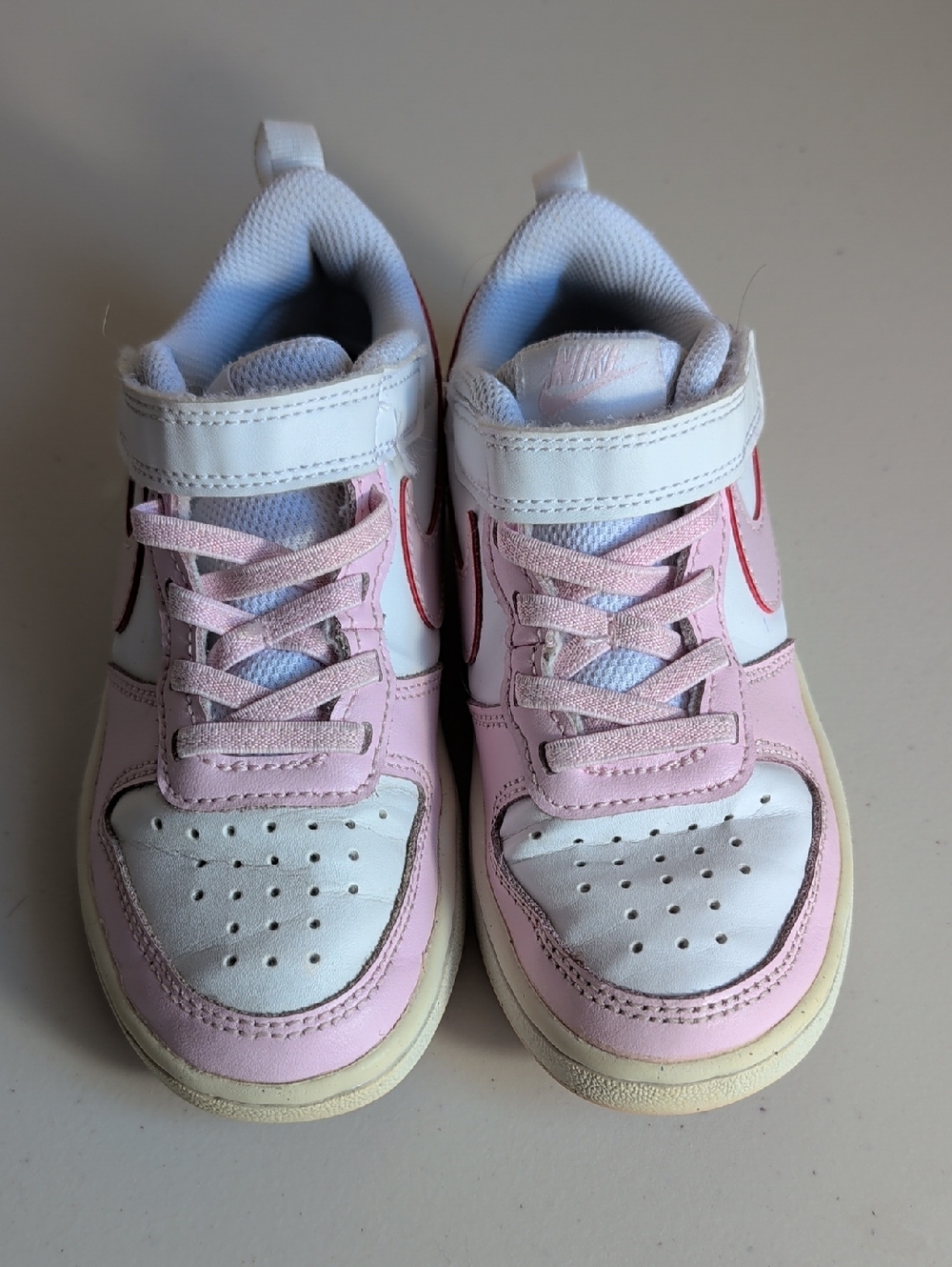 Pink and White Nike Air Force Sneakers